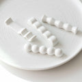 Melitu Spoon & Chopstick Rest - 4pcs image 0