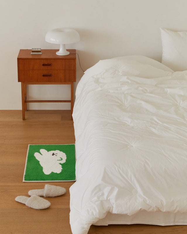 Jacquard Bath Mat - Bichon on the Grass